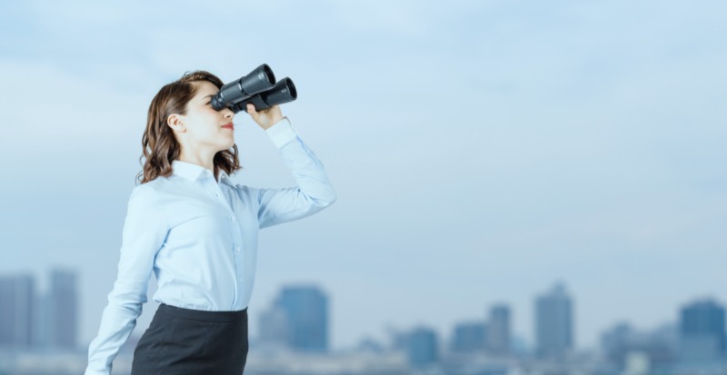 Woman Looking Through Binoculars